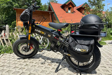 Aniioki A8 Pro Max electric bike parked outdoors during a routine charger inspection and maintenance check